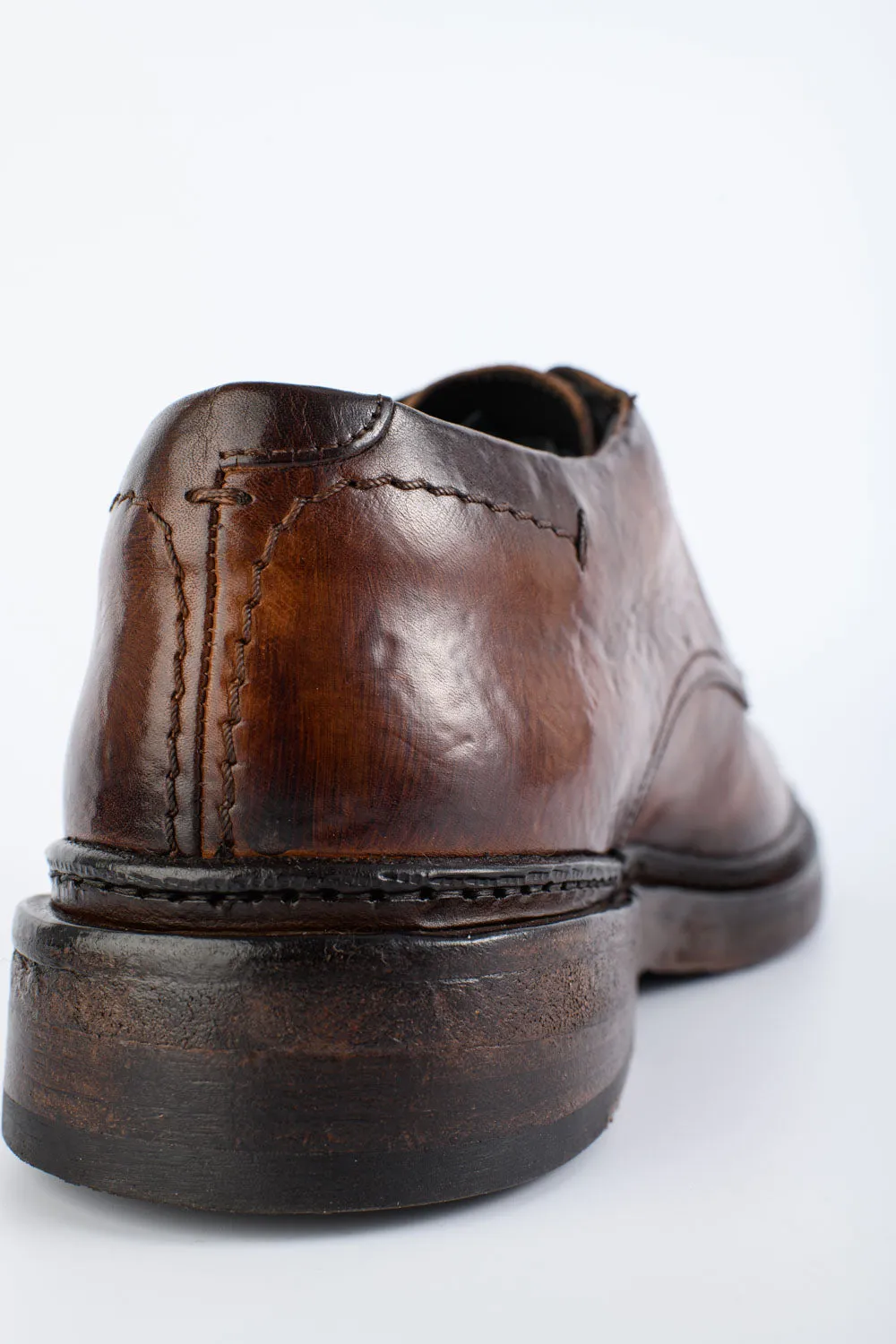 YORK rich-brown welted derby shoes.