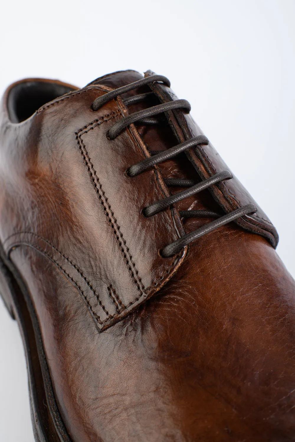 YORK rich-brown welted derby shoes.